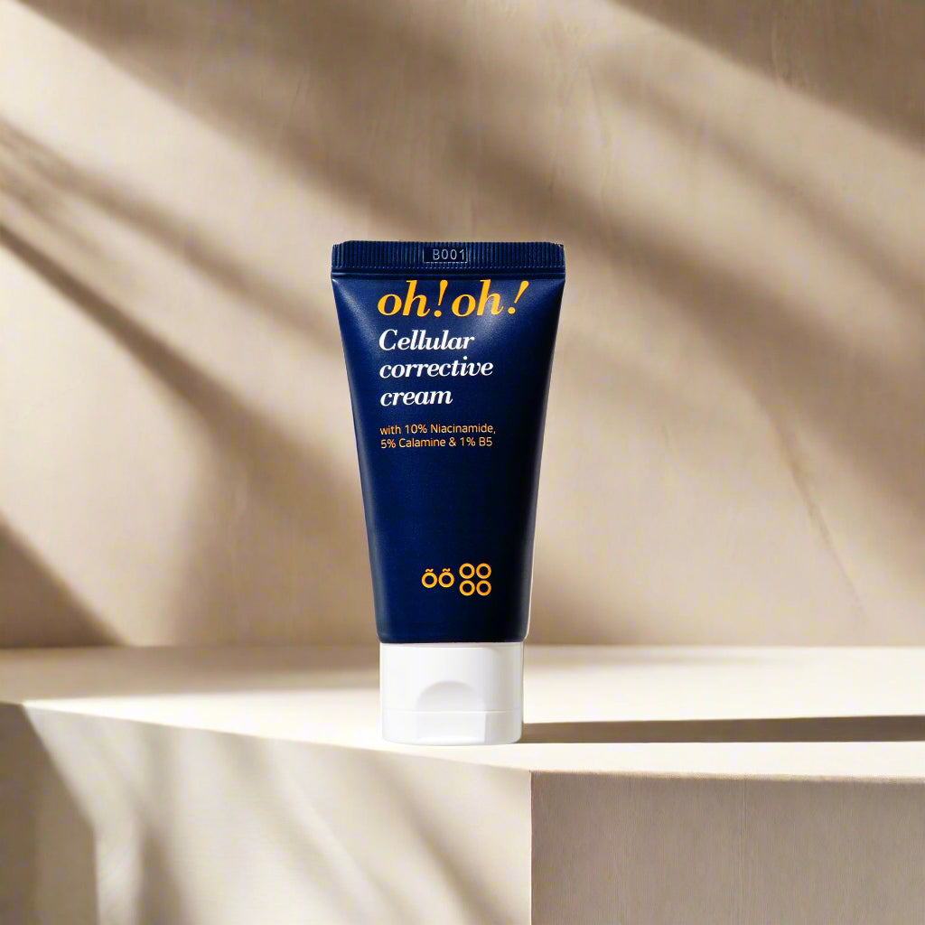 Blue tube of oh!oh! Cellular corrective cream on a white background